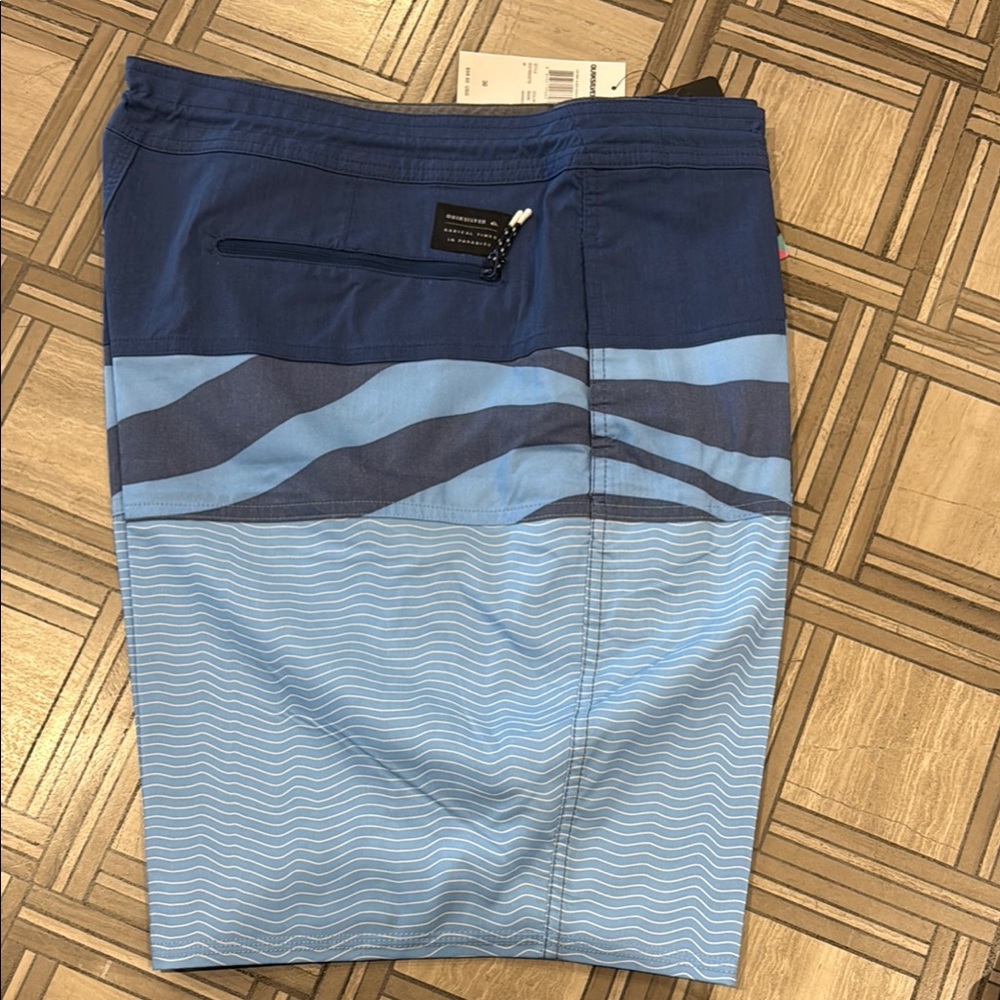 Quiksilver Blue Board Shorts with Gradient Design